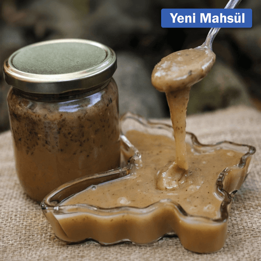 Jar of Nazlikoy Süt Reçeli (460g) with creamy, golden milk-based fruit spread and label visible in the image.